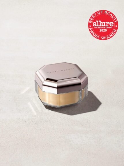  A jar of mini setting powder stood on a gray background with the Allure "Best of Beauty" award stamp overimposed