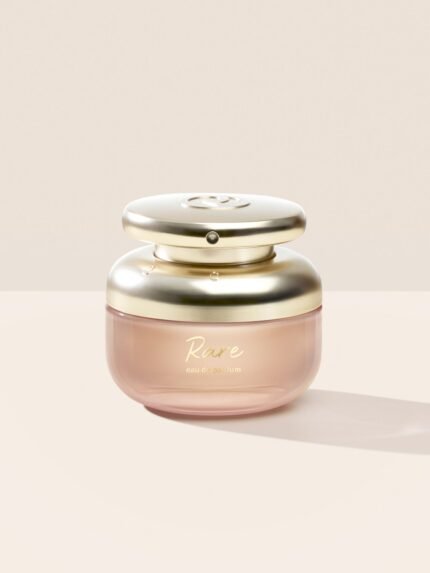 The Rare Eau de Parfum features a rounded bottle design and a gold cap with script writing.