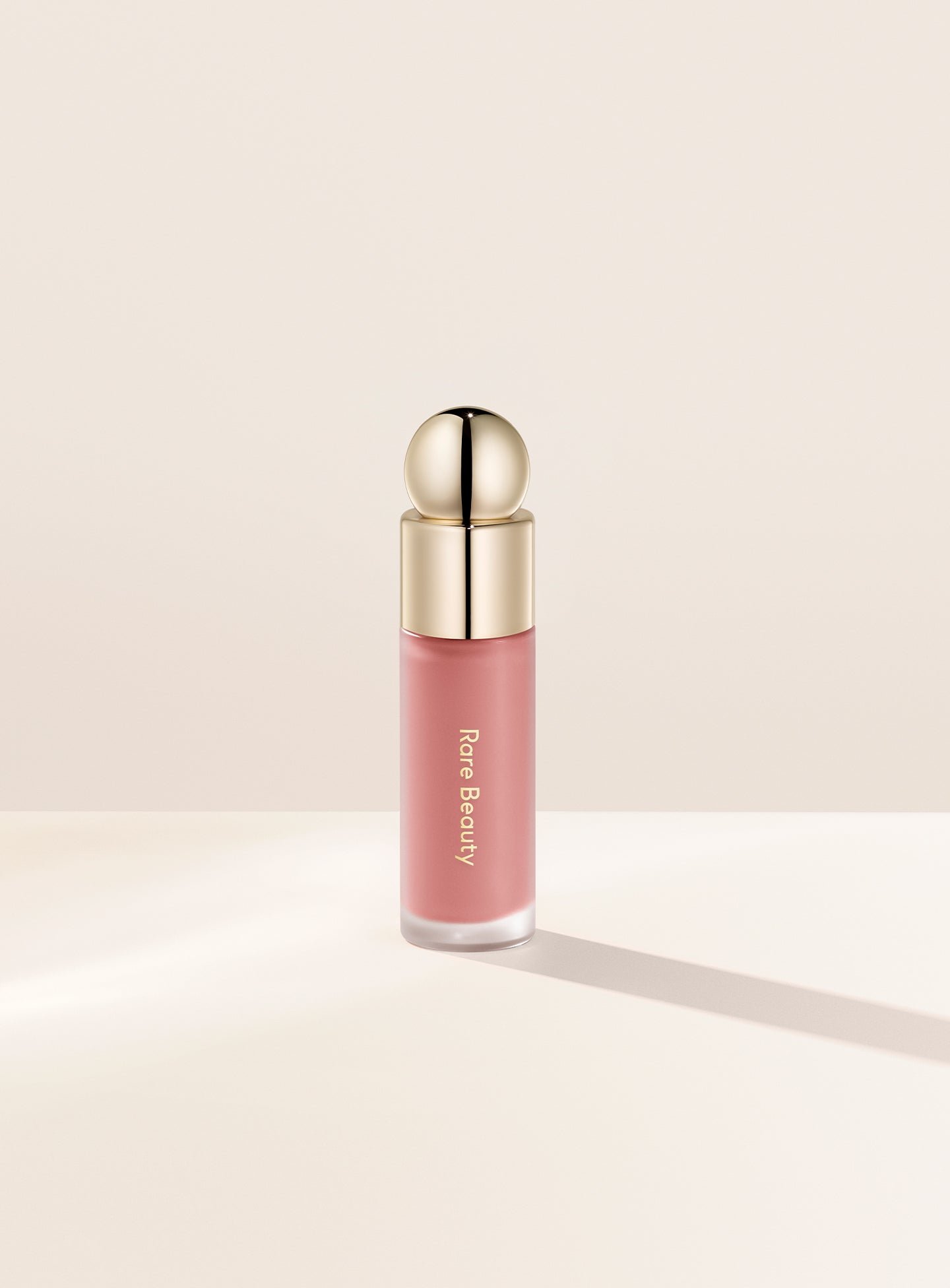ECOMM-SP-LIQUID-BLUSH-DEWY-HOPE Hope| Rare Beauty's Soft Pinch Liquid Blush in the dewy nude mauve shade "Hope."