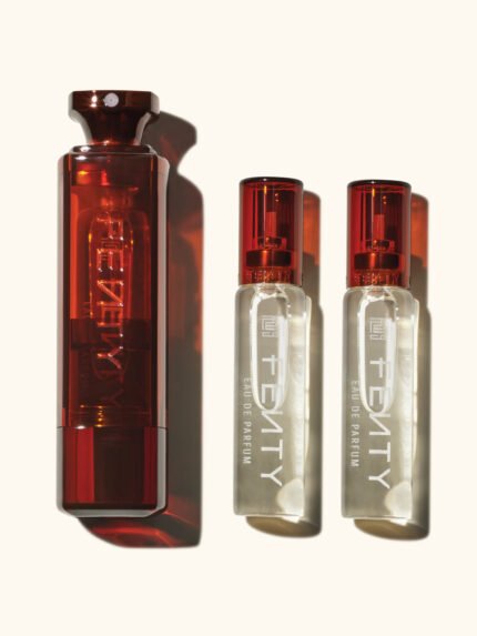 1 travel-size 10ml Fenty bottle placed next to 2 clear bottles for refilling.