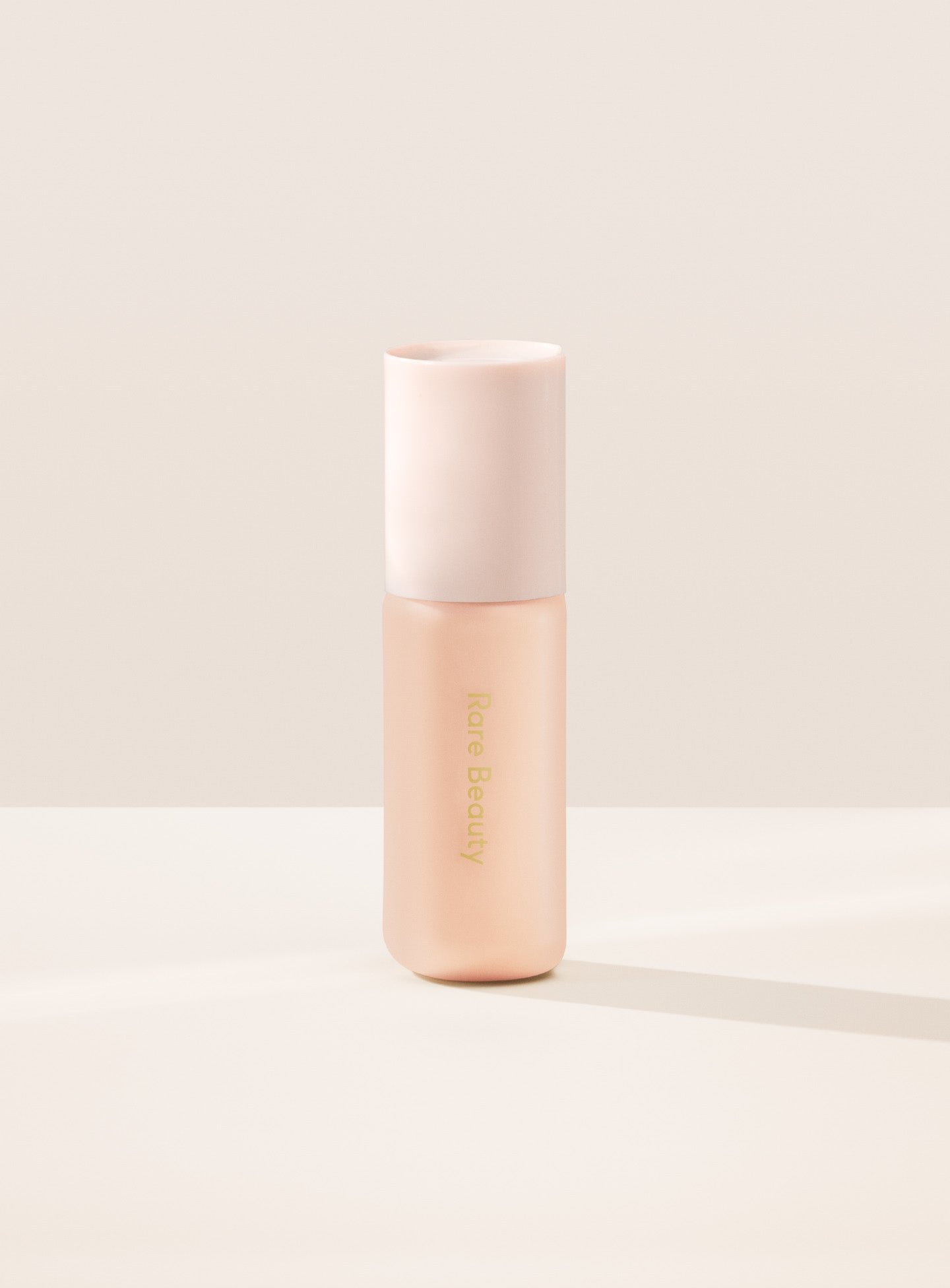 Tinted-Moisturizer-12c-SKU 12C| Shade 12C, Light with Cool Pink Undertone, of Rare Beauty's Positive Light Tinted Moisturizer with SPF.